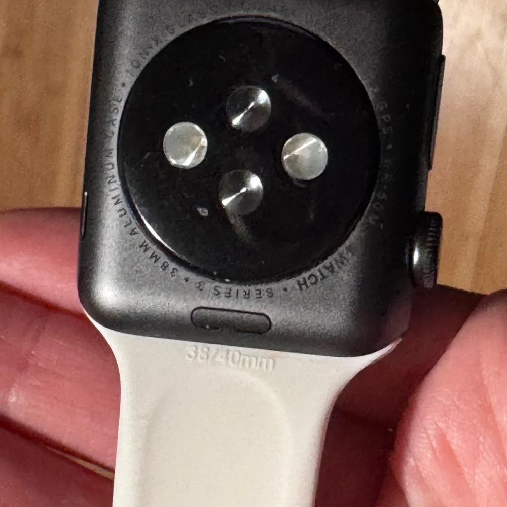 Series 3 Black Apple Watch with 38/40mm white apple silicone band